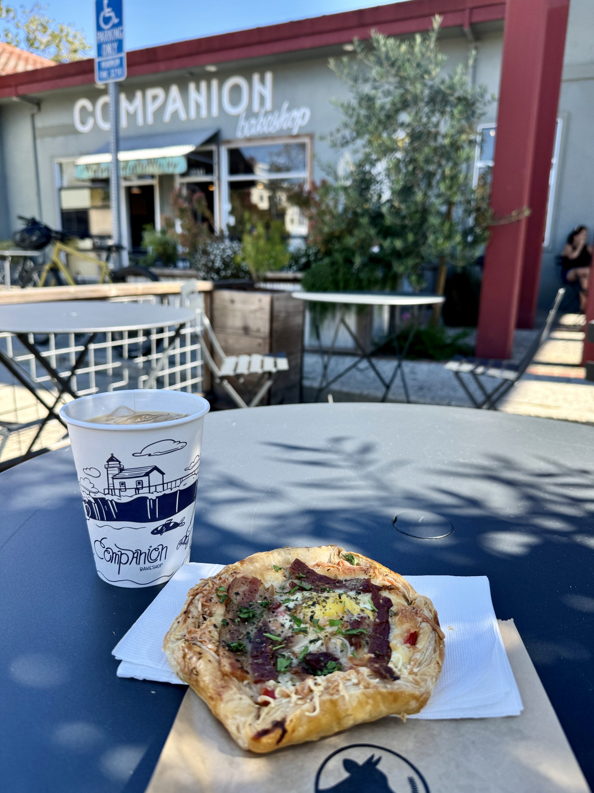 Iced latte and bacon egg galette at Companion Bakeshop